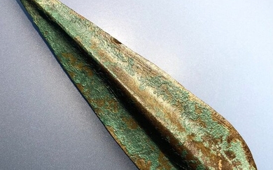 Iron Age Bronze Elegant and Very Rare Spear Head with an Embossed Decorated middle part and Beautiful Leafy Shape