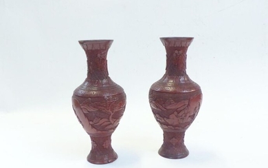 Lacquer, pair of baluster-shaped vases in red lacquer with landscape...