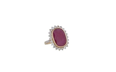 Lady's 18K Yellow Gold Ruby and Diamond Dinner Ring, with an oval 8.75 carat ruby atop a border of