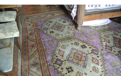 Large Persian style rug with foliate and diamond decoration ...