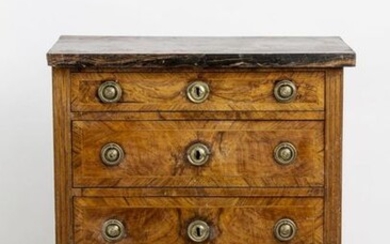 Little Louis Seize dresser. Three drawer body, fluted edges, round...