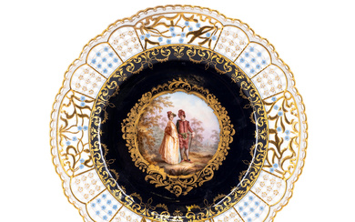 Meissen | DECORATIVE PORCELAIN PLATE WITH PIRCED RIM, COBALT BLUE GROUND AND LARGE MEDALLION WITH PARK SCENE
