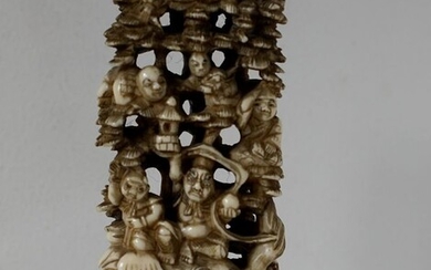 Okimono - Ivory - Tamonten 多聞天 on a shishi and immortals on a tree - Signed Gyokushi 玉之 - Japan - Meiji period (1868-1912)
