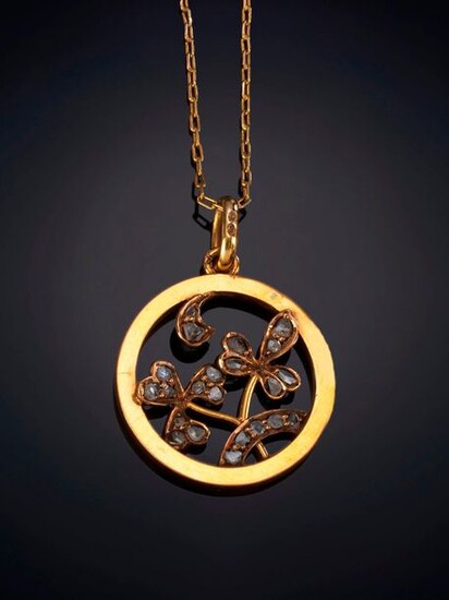 PENDANT IN THE FORM OF A CIRCLE WITH PLANT DECORATION WITH ANTIQUE CUT DIAMONDS CLOVERS. Frame in 18k yellow gold. Price: 150,00 Euros. (24.958 Ptas.)