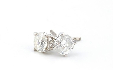 Pair of 14K White Gold Stud Earrings, each with a round