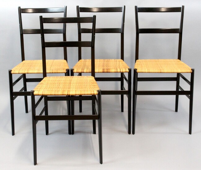 Quattro sedie Cassina, modello Superleggera design Gio Ponti, struttura in legno laccato nero, altezza cm 83.