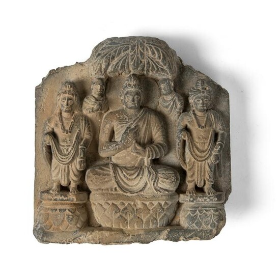 SCHIST PANEL WITH SEATED BUDDHA FLANKED BY ATTENDANTS