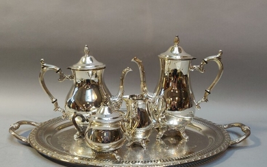 SERVICE à THE et CAFE en métal argenté de style Louis XV à décor feuillagé...