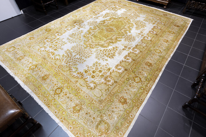 Signed finely knotted Tabriz in very fine wool...