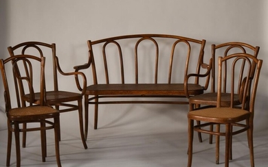 THONET. Thermo-curved and caned wood set comprising : - a double bench (H: 88, W: 128, D: 55 cm) - two pairs of armchairs of approximately similar models - two pairs of chairs of roughly similar designs Label and Thonet iron mark for the set. (Some...