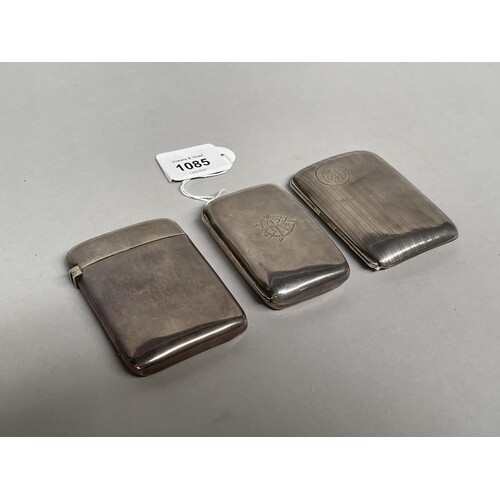 Three sterling silver cigarette cases, two Birmingham and th...