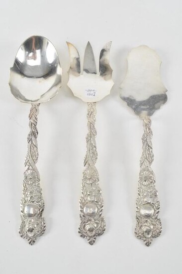Trio sterling silver repousse serving utensils. South