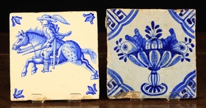 Two Blue & White Tiles: A 17th century tile painted with an urn of fruit to the centre and decorativ