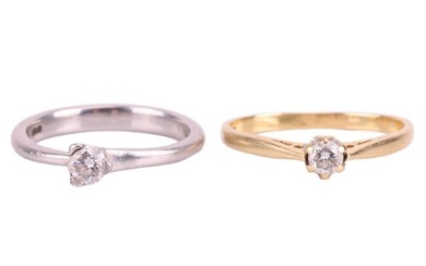 Two diamond solitaire rings, the first claw-set with a round brilliant diamond measuring approximate