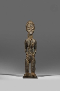 Une ancienne statuette waka sona féminine au trait…