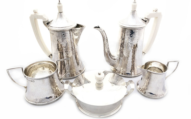 Uniqe hammer work silver tea set, 5 pieces with...