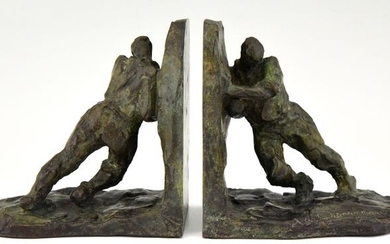 Victor Demanet - Art Deco bronze bookends pushing men