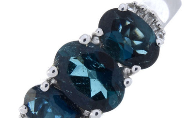 18ct gold blue tourmaline & colourless gem ring