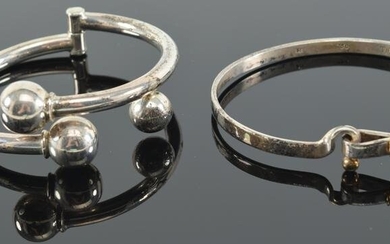 2 Tiffany & Co. sterling silver bracelets, one with 18K
