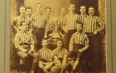 VERY EARLY 1884 WOLVERHAMPTON WANDERERS PHOTOGRAPH ENTITLED WANDERERS WREKIN CUP TEAM 1884 DEPICTS THE TEAM WITH THE CUP TO CENTRE NAMES IN PEN BELOW