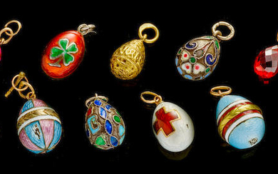 A group of eleven silver and gold-mounted enamelled and jewelled miniature eggs