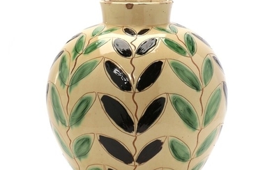 Kähler: A round earthenware vase decorated with cream coloured glaze, incised with plant motifs decorated with black and green glaze. H. 36 cm.