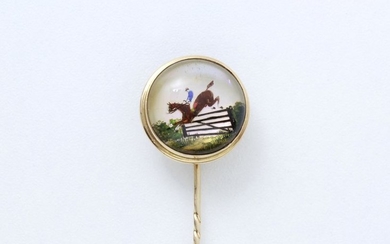 750-thousandths gold tie pin, decorated with a miniature...