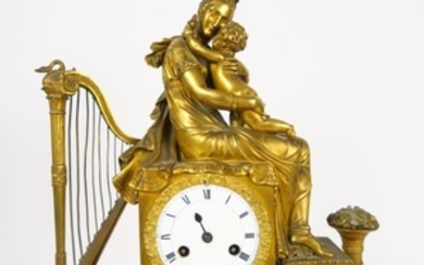 Pendule début XIXème en bronze doré « Maternité » …