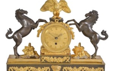 A Regency ormolu and patinated bronze mantel timepiece