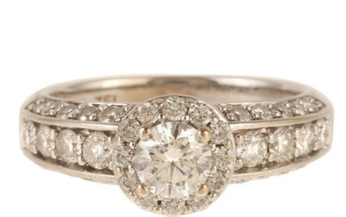 A 1.50ctw Diamond Halo Ring in 18K