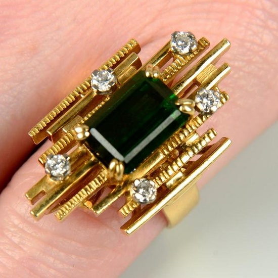A 1970s 18ct gold green tourmaline and brilliant-cut diamond ring.Green tourmaline calculated weight