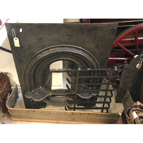 A 19th Century cast iron bedroom fireplace with integral ket...