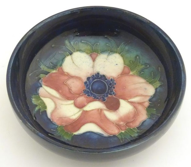 A 20thC Moorcroft circular dish decorated with an
