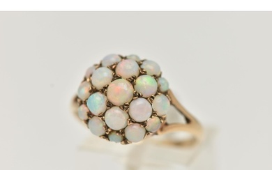 A 9CT GOLD OPAL CABOCHON DOME RING, circular dome set with c...
