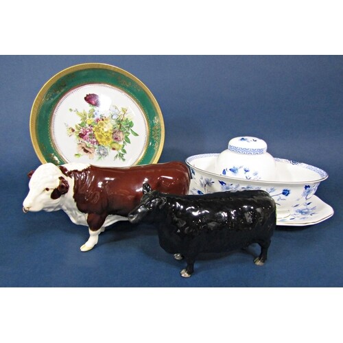A Beswick Aberdeen Angus cow together with a Beswick Herefor...