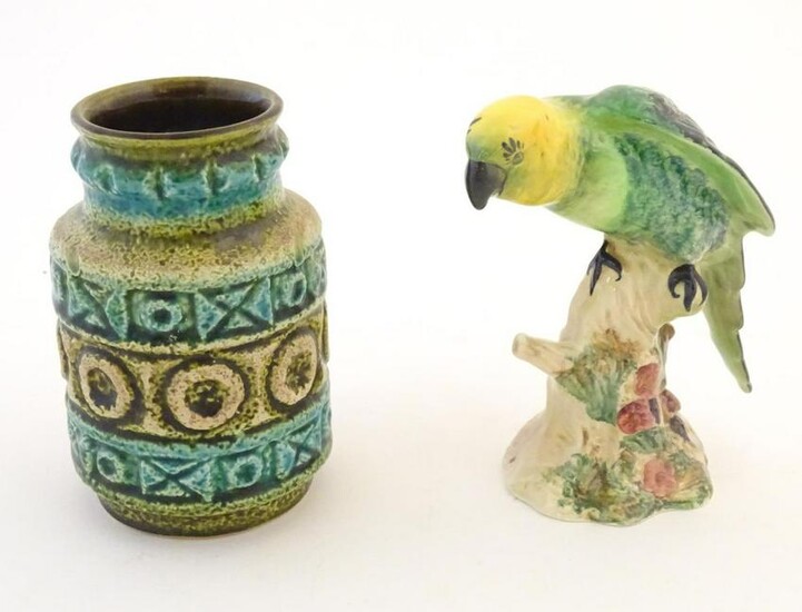 A Beswick model of a parrot, no. 930. Together with a