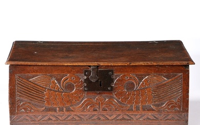 A CHARLES II BOARDED OAK BOX, CIRCA 1670. The hinged lid pri...
