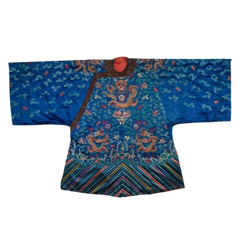 A CHINESE BLUE SILK DRAGON ROBE embroidered in colourful sil...