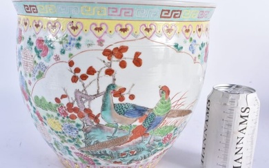 A CHINESE REPUBLICAN PERIOD FAMILLE ROSE PORCELAIN JARDINIERE painted with birds and foliage. 22 cm