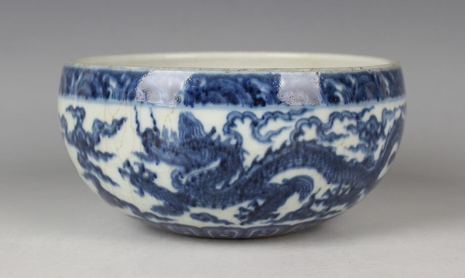 A Chinese Ming style blue and white porcelain circular bowl, mark of Xuande but later, the exterior