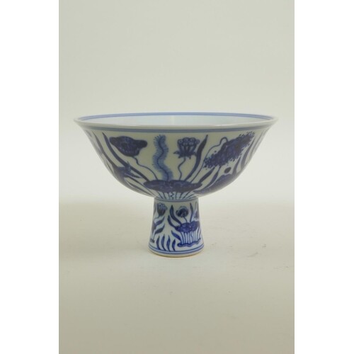 A Chinese Ming style blue and white porcelain stem cup decor...