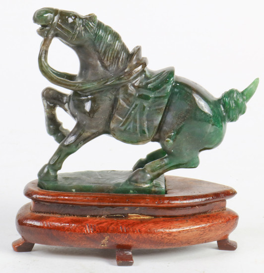 A Chinese Spinach Hardstone Carved Horse