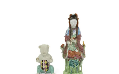 A Chinese famille rose figure of Guanyin and a famille rose boy,...