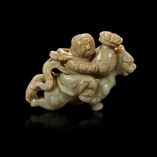A Chinese greyish white jade carving of a foreigner
