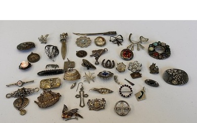 A Collection of Silver Jewellery inc Brooches, Pendants & Ot...