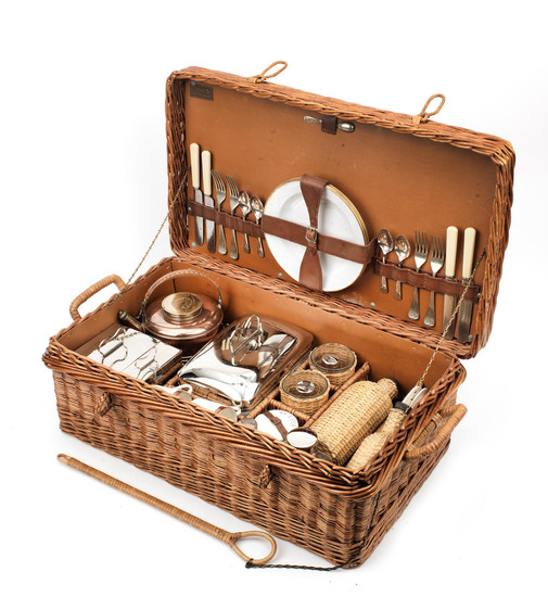 A 'Coracle' brand wicker-cased picnic set for four persons by G W Scott & Sons, circa 1909