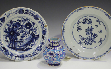 A Dutch Delft plate, 19th century, blue painted with flowers, diameter 22.5cm, together with an Engl