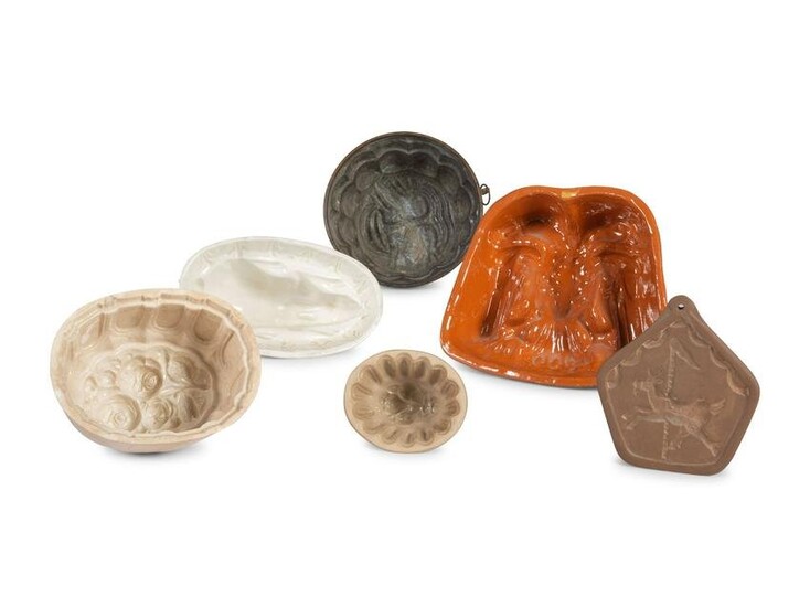A Group of Ceramic and Copper Jello Molds
