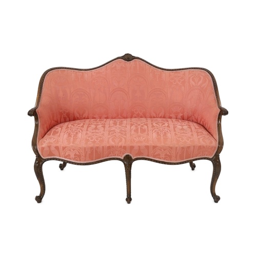 A Hepplewhite style mahogany settee with shell carved gadroo...