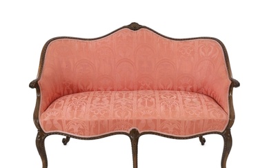 A Hepplewhite style mahogany settee with shell carved gadroo...